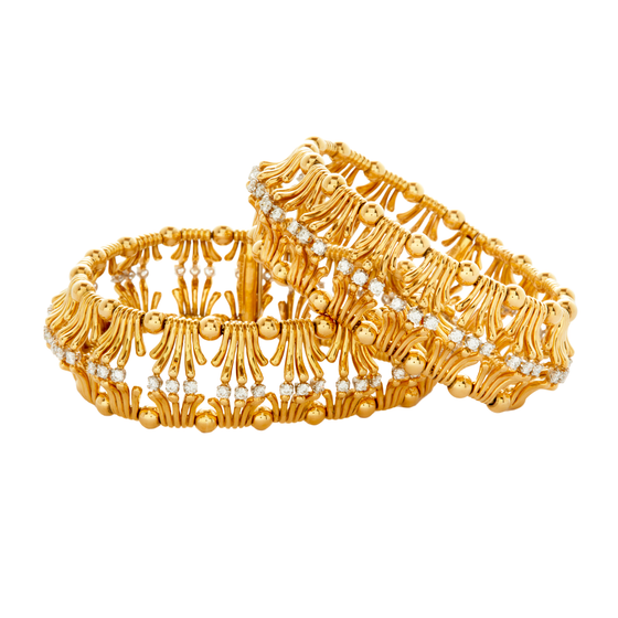 Jean Schlumberger for Tiffany & Co. Diamond, Platinum and 18K Yellow Gold Pair of Hands Bracelets