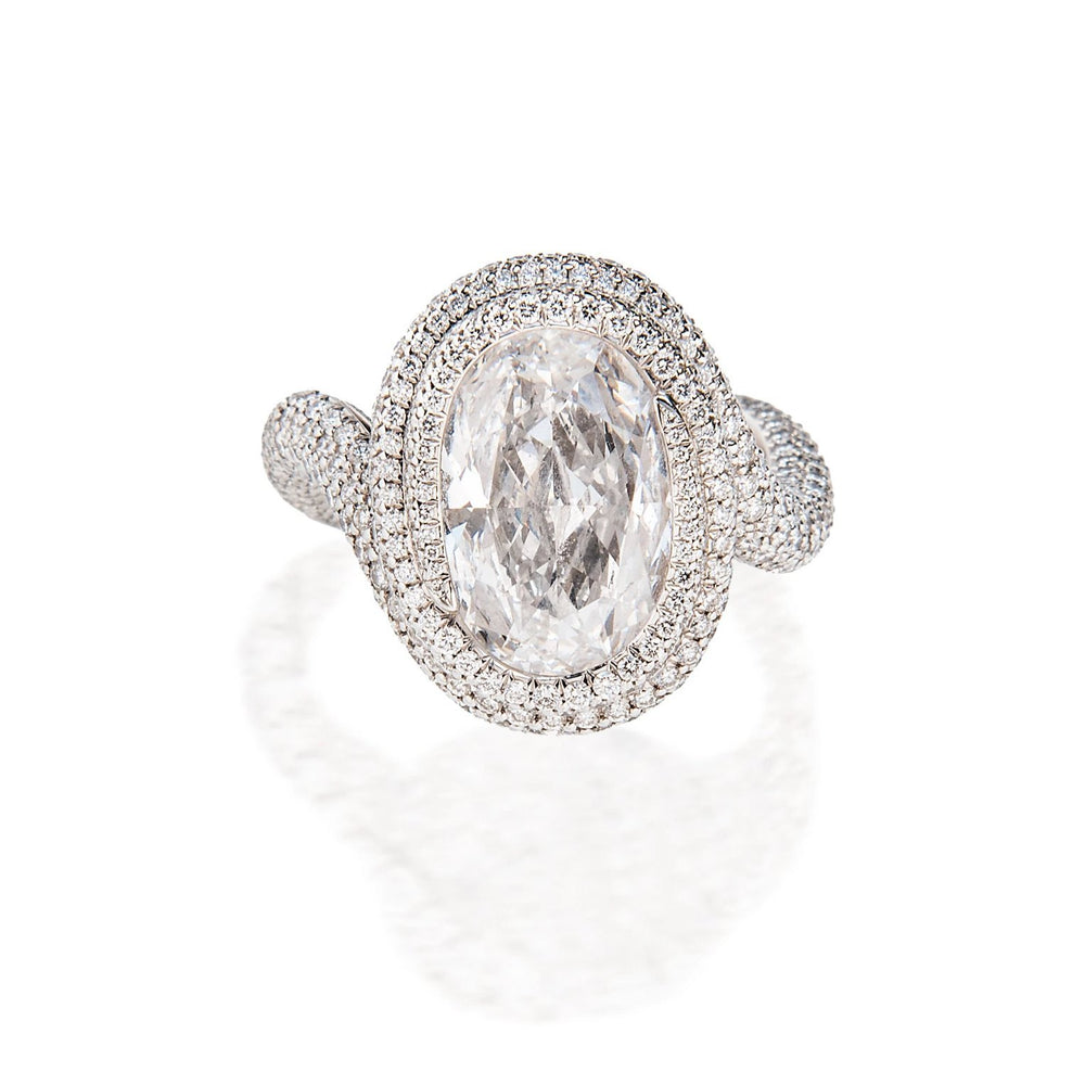 
                      
                        Chopard Twist Ring with Internally Flawless Oval Diamond
                      
                    