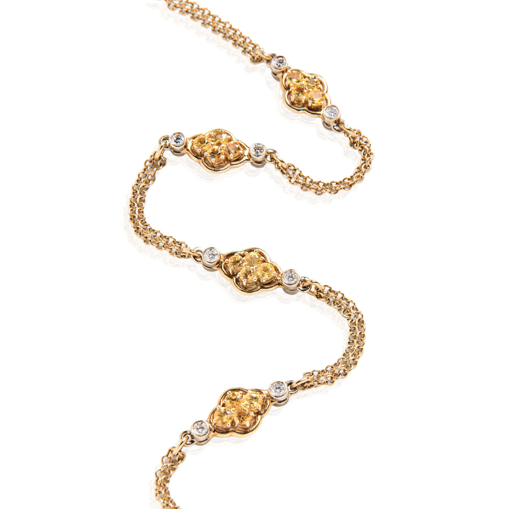 
                      
                        David Morris Gold, Yellow Sapphire and Diamond Double-Sided Long Chain
                      
                    